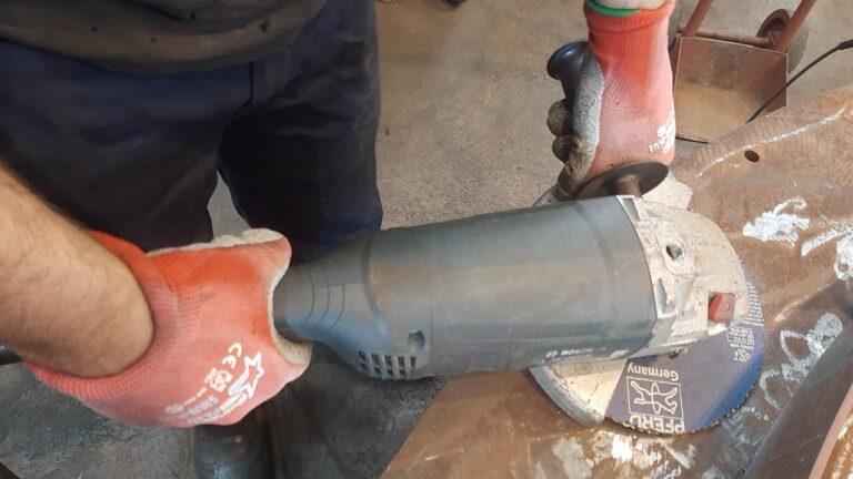 Holding an angle grinder
