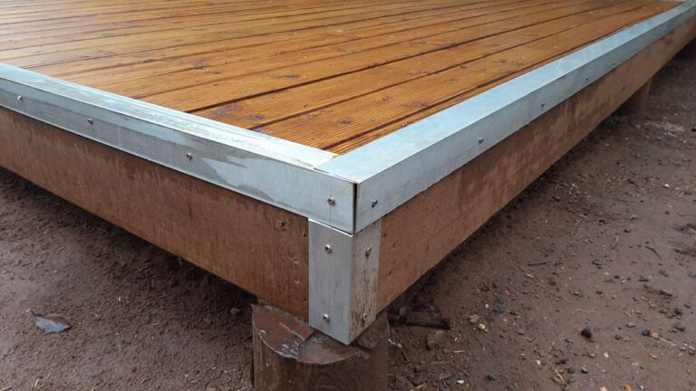 Angle iron around a wooden deck